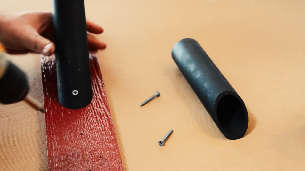 Start attaching the PVC pipe to the board from the top down.