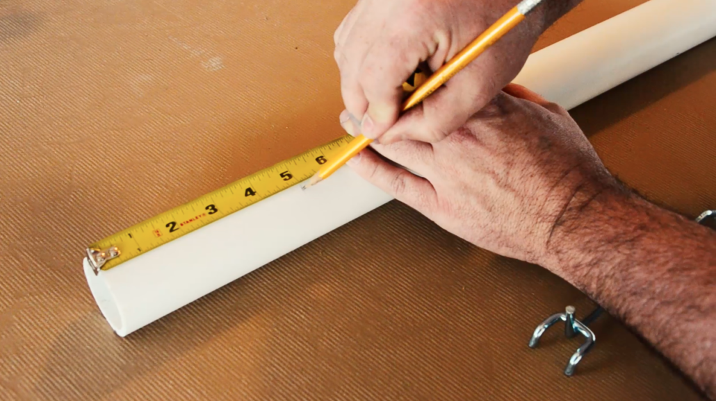 Start by measuring the length of the pegboard hook to your PVC pipe.