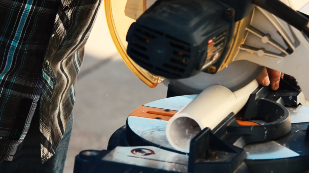 Slice the PVC pipe straight along the mark you previously made.