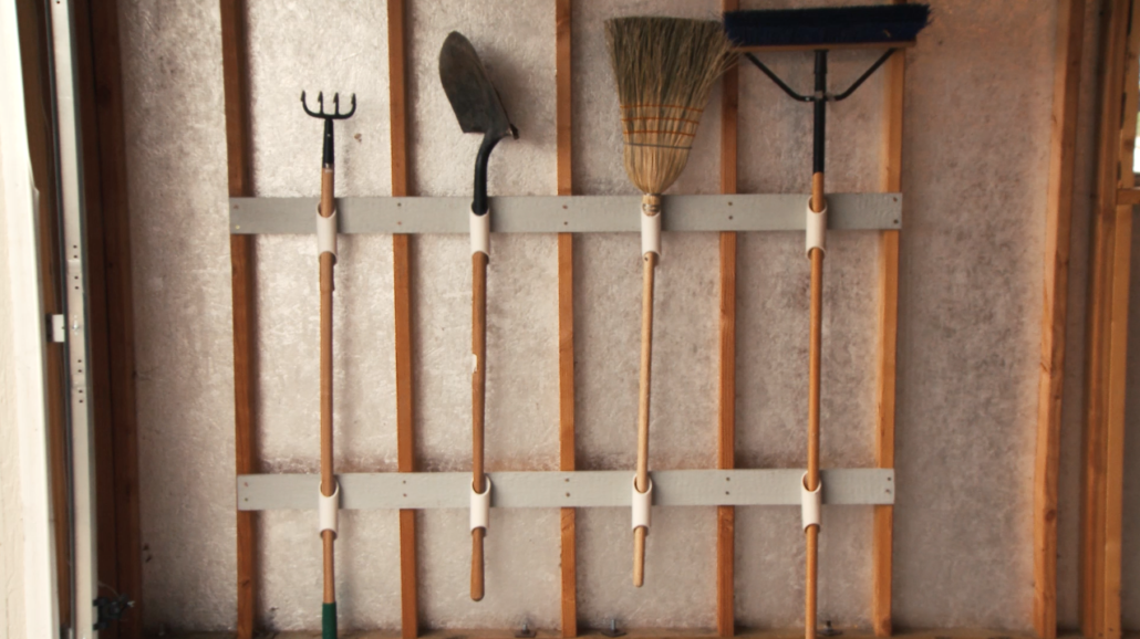 Store your long-handled tools with this easy wall organizer.