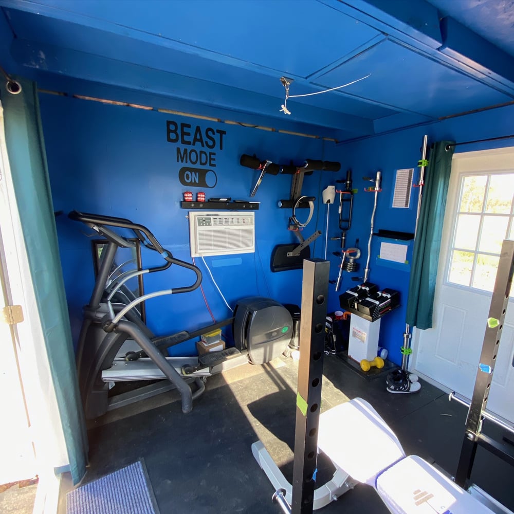 Chris' Gym Shed has room for all his workout equipment.