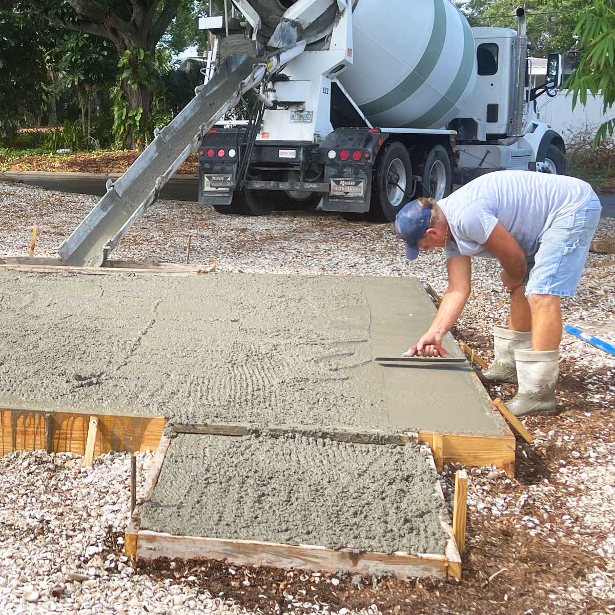 The team working on the cement pad for the new studio.