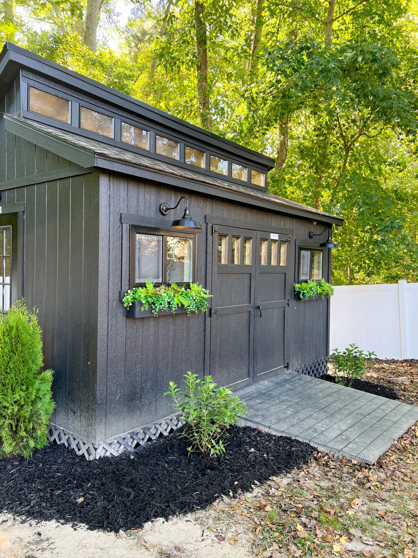 The exterior of Cass' workshop shed, a Premier PRO Tall Ranch.