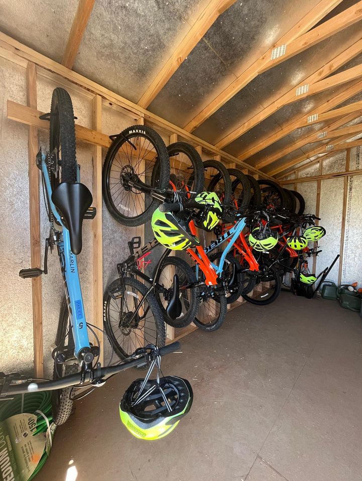 Interior of shed with bikes on wall